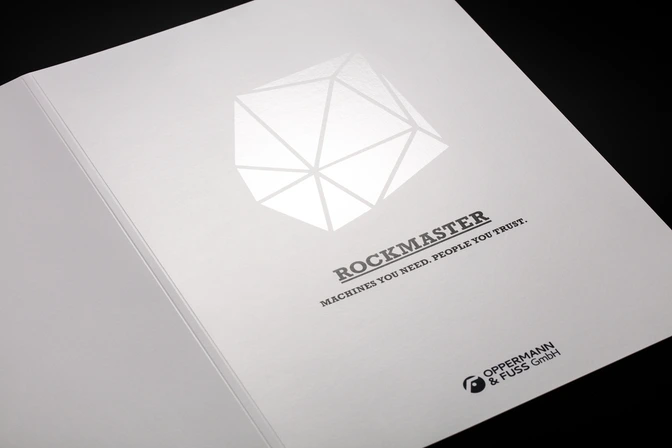 Print: ROCKMASTER brochure with silver-foil logo on textured cover