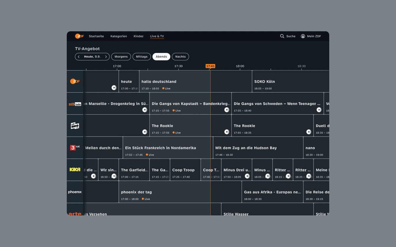 Desktop web: TV schedule grid with timeline, channel rows, and live indicator